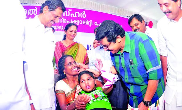 Minister for Social Welfare and Panchayath M.K. Muneer with Shafeeq, who is back from CMC Vellore after his stage-two treatment of four months, in Thodupuzha on Monday. Water resources minister P.J. Joseph is also seen. (Photo: DC) Minister for Social Welfare and Panchayath M.K. Muneer with Shafeeq, who is back from CMC Vellore after his stage-two treatment of four months, in Thodupuzha on Monday. Water resources minister P.J. Joseph is also seen. (Photo: DC)
